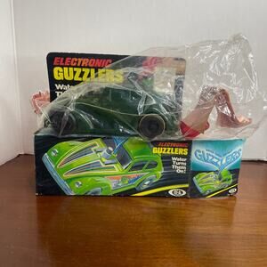 Vintage Ideal Greem VW Beetle ELECTRONIC GUZZLERS Water Turns Them On!